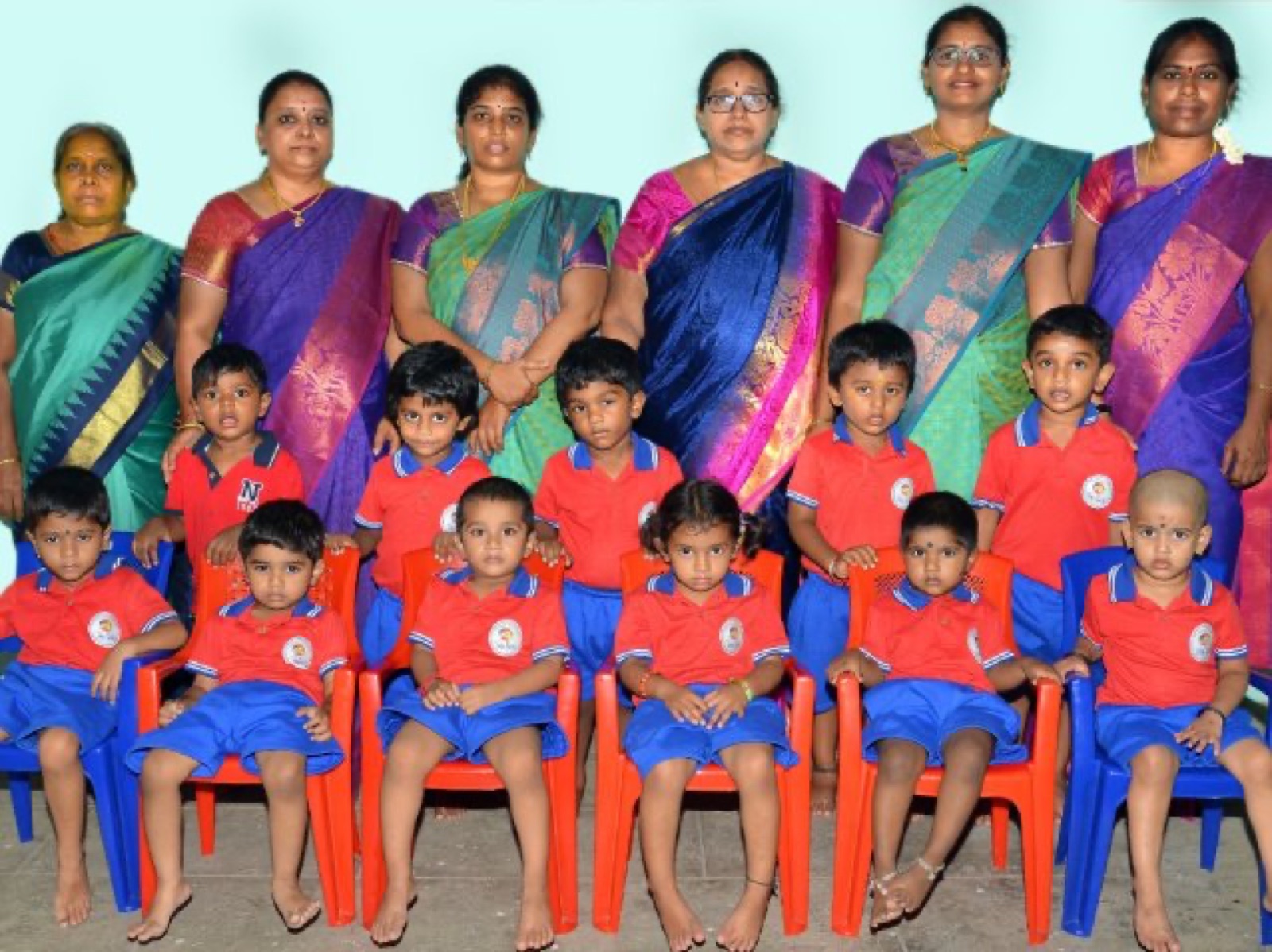 Tiny Seeds teachers with the children